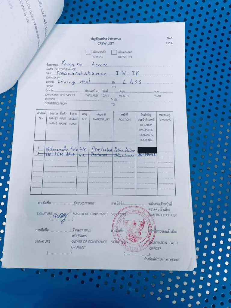 Stamped Thai customs form for temporarily taking a motorbike abroad