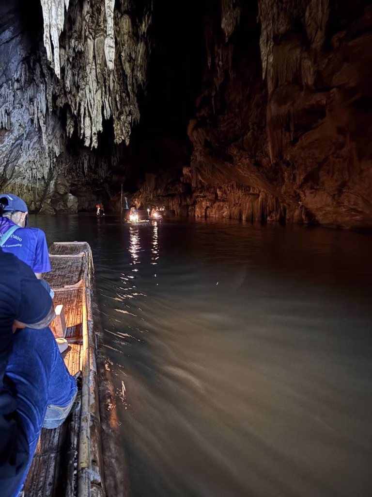 Bamboo raft on the river inside Tham Lot cave