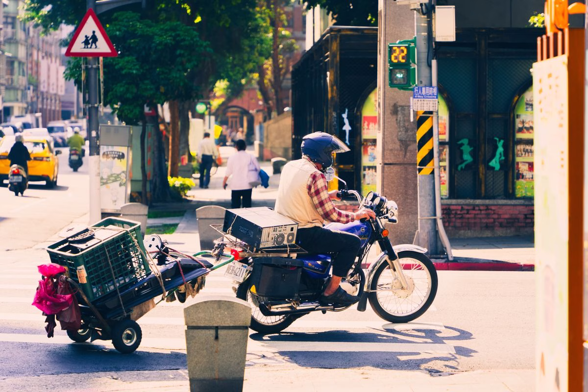 Motorcycle traffic on a busy Asian city street